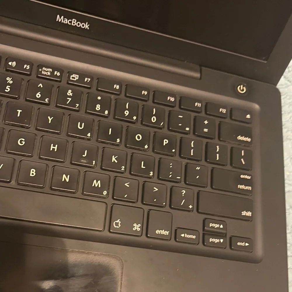 Apple Black Laptop with Sleek Design and Premium Finish